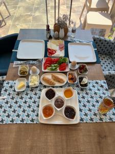 a table with several plates of food on it at Casablanca Hotel in Dalyan