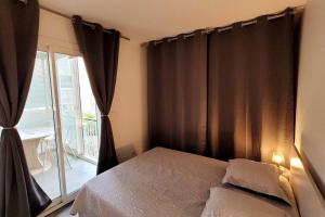 Posteľ alebo postele v izbe v ubytovaní Comme à la maison!!A 5 min à pied plage,pkg privé