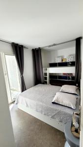 Posteľ alebo postele v izbe v ubytovaní Comme à la maison!!A 5 min à pied plage,pkg privé