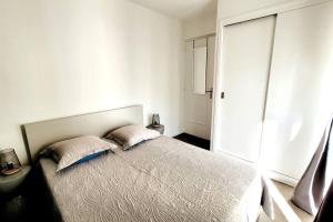 Posteľ alebo postele v izbe v ubytovaní Comme à la maison!!A 5 min à pied plage,pkg privé
