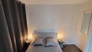 Posteľ alebo postele v izbe v ubytovaní Comme à la maison!!A 5 min à pied plage,pkg privé