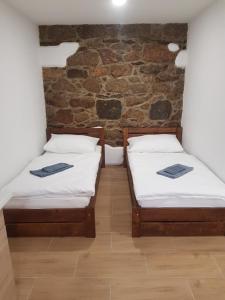 Postel nebo postele na pokoji v ubytování Penzion na statku Březová
