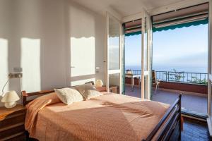 A bed or beds in a room at Orizzonti blu! In villaggio esclusivo con terrazza
