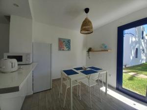 Kuchyň nebo kuchyňský kout v ubytování Los Barqueros 9 by Best Holidays Fuerteventura