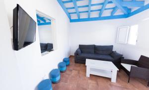 TV a/nebo společenská místnost v ubytování Hotel La Torre