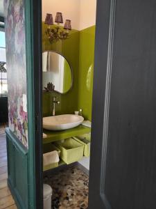 Ένα μπάνιο στο La Demeure du Collectionneur