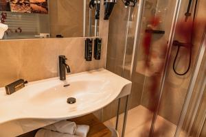 Koupelna v ubytování ''die Bergerin'' | Appartements Schladming