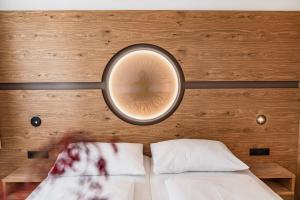 Postel nebo postele na pokoji v ubytování ''die Bergerin'' | Appartements Schladming + 37 fotografií