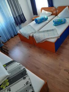 Postel nebo postele na pokoji v ubytování Pensiunea Vidra