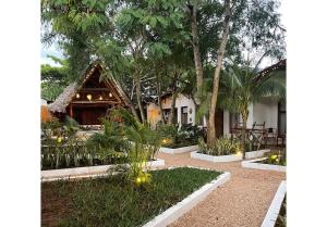Ein Garten an der Unterkunft Babalao Bungalows