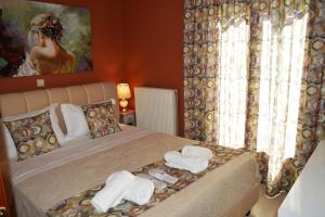A bed or beds in a room at Best House, Sea View II, Pylos Messinias