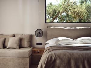 A bed or beds in a room at Cielo villas - An Authentic Mediterranean Living