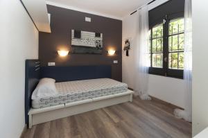 Postel nebo postele na pokoji v ubytování 1215 BAIX CAMP casa con jardin - Apivend Immo + 24 fotografií