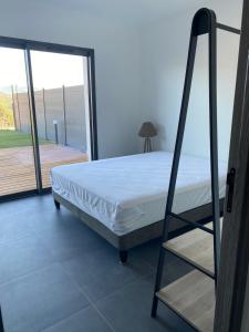 Postel nebo postele na pokoji v ubytování Résidence LMG