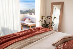 Postel nebo postele na pokoji v ubytování LazySun