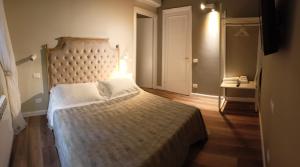 Voodi või voodid majutusasutuse Gian Paul Hotel toas