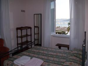 Postel nebo postele na pokoji v ubytování B&B Portobello