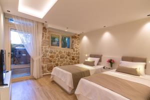 Postel nebo postele na pokoji v ubytování La Mer Comfort