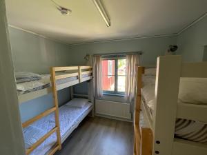 Voodi või voodid majutusasutuse Aspan Kurs & Lägergård toas