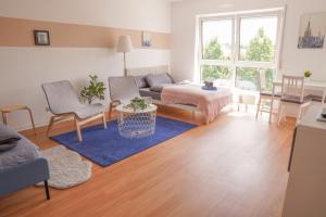 Posezení v ubytování FULL HOUSE Studios - KornhausPremium Apartment - Balkon, WiFi