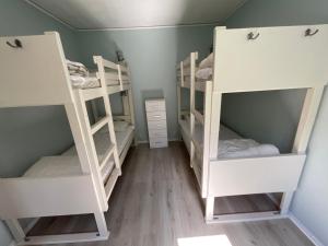 Voodi või voodid majutusasutuse Aspan Kurs & Lägergård toas