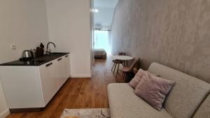 Kuchyňa alebo kuchynka v ubytovaní Apartmán Style Nízke Tatry