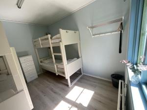 Voodi või voodid majutusasutuse Aspan Kurs & Lägergård toas