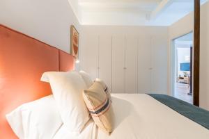 Postel nebo postele na pokoji v ubytování Puerta Real Home Apartment 2