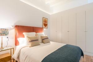 Postel nebo postele na pokoji v ubytování Puerta Real Home Apartment 2