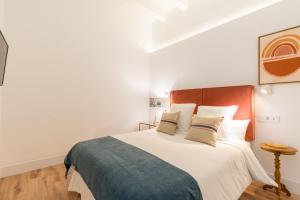 Postel nebo postele na pokoji v ubytování Puerta Real Home Apartment 2