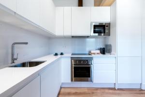 Kuchyň nebo kuchyňský kout v ubytování Puerta Real Home Apartment 2