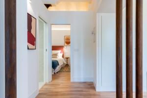 Postel nebo postele na pokoji v ubytování Puerta Real Home Apartment 2