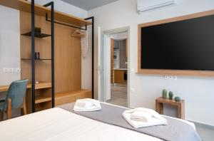 Postel nebo postele na pokoji v ubytování Crown Designed Apartments