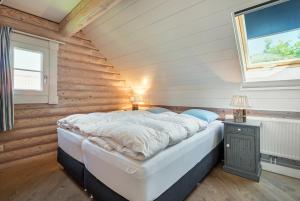 Katil atau katil-katil dalam bilik di Strandhuis De Pierewaaier