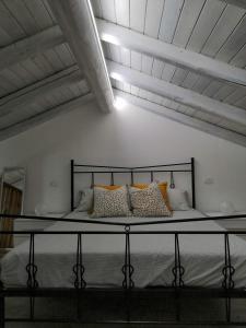 Krevet ili kreveti u jedinici u okviru objekta Le Casette tra gli Ulivi