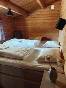 Postel nebo postele na pokoji v ubytování Åndalsnes Hytteutleie
