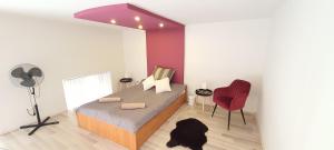 Posteľ alebo postele v izbe v ubytovaní Apartman Szeged szívében
