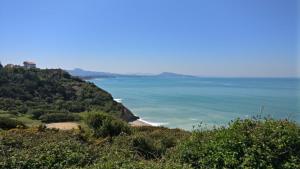 a view of the ocean from a hill at Le Rooftop des Halles in Biarritz