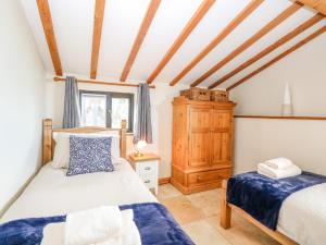 Postel nebo postele na pokoji v ubytování Hargate Farm Barn