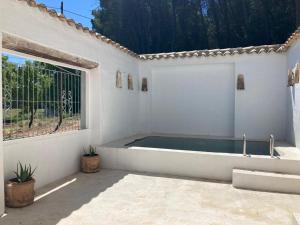 Bazén v ubytování LosGuachos_ casa rural nebo v jeho okolí