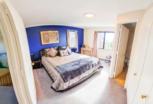 מיטה או מיטות בחדר ב-Fairhall Lodge