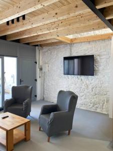 Μια τηλεόραση ή/και κέντρο ψυχαγωγίας στο Casa para 8, Santillana y playas