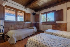 Postel nebo postele na pokoji v ubytování Casale I Cascetti