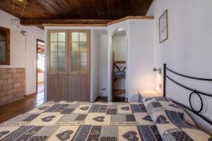 Postel nebo postele na pokoji v ubytování Casale I Cascetti
