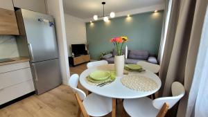 Kuchyňa alebo kuchynka v ubytovaní Apartament Arkadia Augustow