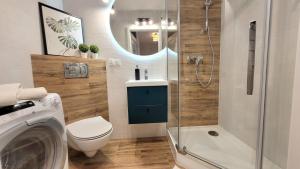 Kúpeľňa v ubytovaní Apartament Arkadia Augustow