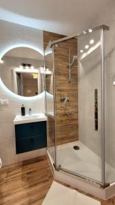 Kúpeľňa v ubytovaní Apartament Arkadia Augustow + 14 fotografií