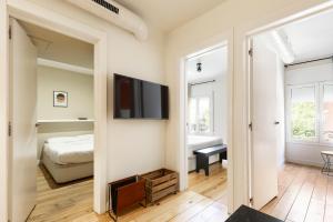 Posteľ alebo postele v izbe v ubytovaní WOW Apartments by Olala Homes