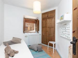 Posteľ alebo postele v izbe v ubytovaní Preciosa casa rural en el centro de Peratallada
