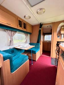 Posezení v ubytování Apusenia Caravan Escape Padiș - Glăvoi + 9 fotografií